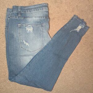 Distressed Light Wash Stretch Jeans